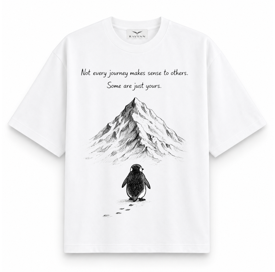 RAVYNN Oversized White T-Shirt – "Not Every Journey" Penguin & Mountain Graphic