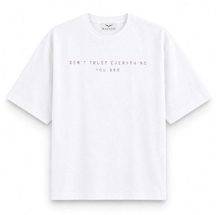 RAVYNN Oversized White T-Shirt – "Realistic / Don't Trust Everything You See" Sculpture Back Graphic