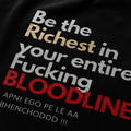RAVYNN Oversized Black T-Shirt – "Be The Richest In Your Bloodline" Graphic