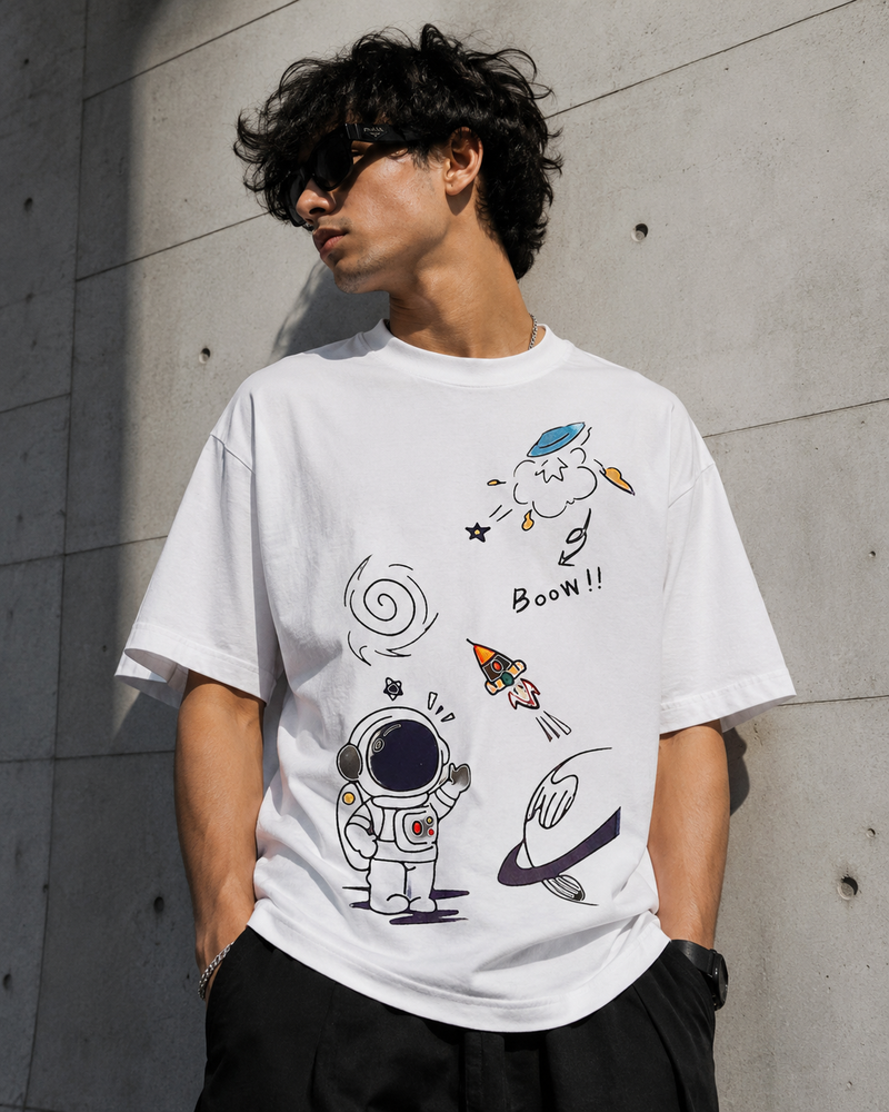 RAVYNN Oversized White T-Shirt – Doodle Astronaut & Space Rocket Graphic