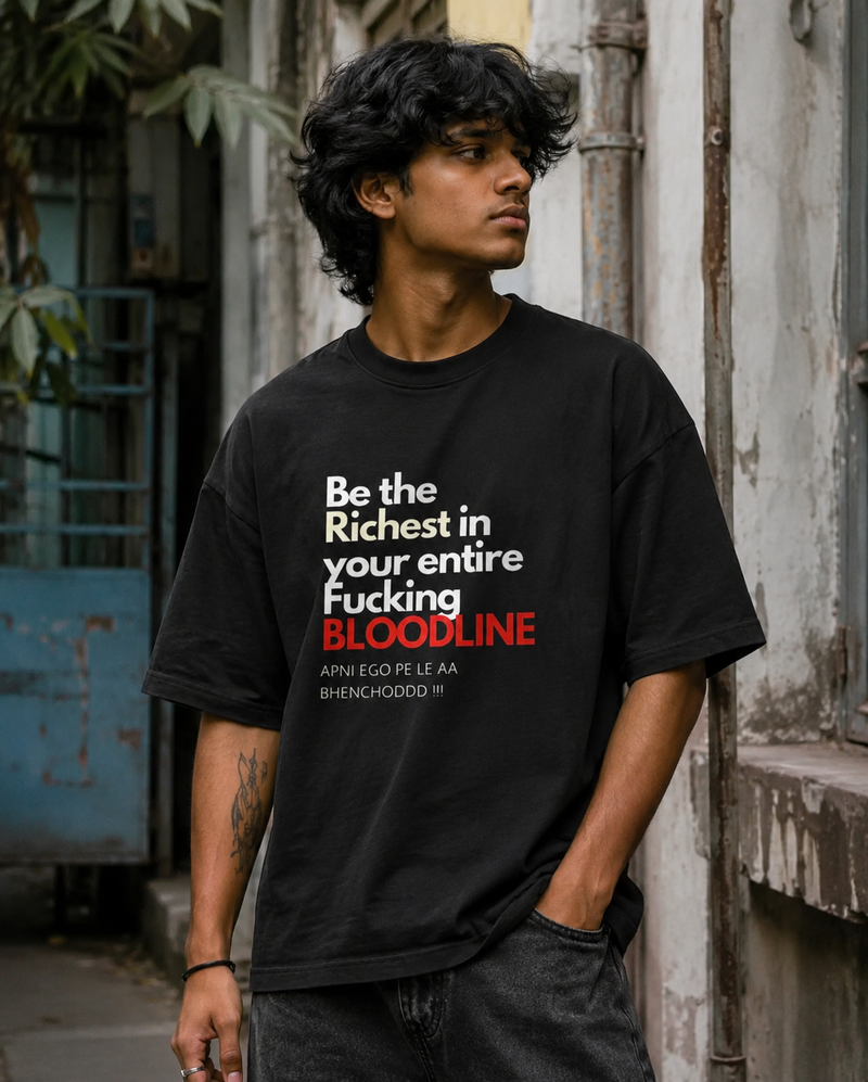 RAVYNN Oversized Black T-Shirt – "Be The Richest In Your Bloodline" Graphic