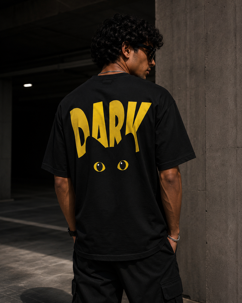RAVYNN Oversized Black T-Shirt – Yellow "DARK" Black Cat Graphic